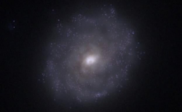 Descubren con detalle cómo una galaxia engulle a otra./Universidad de Durham