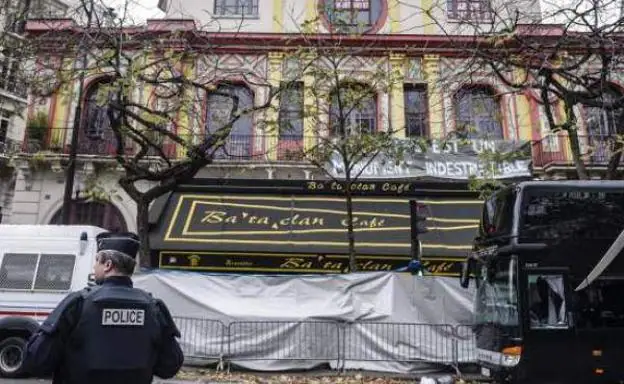 Surveillance.  A French agent stands guard in front of the entrance to the Bataclan theater as it remains closed in the wake of the attacks six years ago.