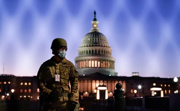 A soldier stands guard outside the Capitol as the impeachment process of President Donald Trump is debated.