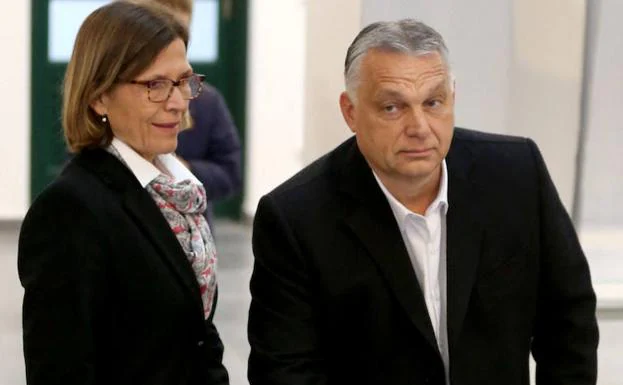 Orban casts his vote alongside his wife, Aniko Levai.