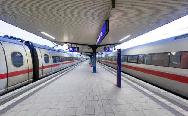 Two long-distance Inter City Express (ICE) trains of the German rail operator Deutsche Bahn in Bielefeld, western Germany.