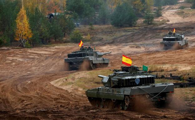 Spanish Leopard 2E (Leopard 2 A4) main battle tanks during NATO maneuvers. 