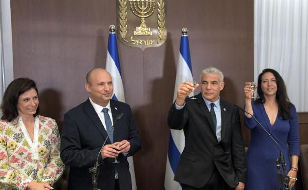 Naftali Bennett and Yair Lapid carried out the transfer of powers at the prime minister's office in Jerusalem. 