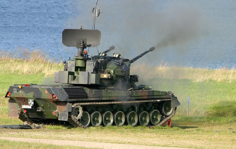 A German Army tank conducts target practice at the base in Toderndorf. 