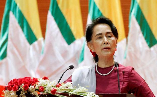 Aung San Suu Kyi delivers an address to the nation in a 2017 file image.